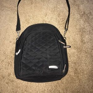 Black purse with lots of storage compartments